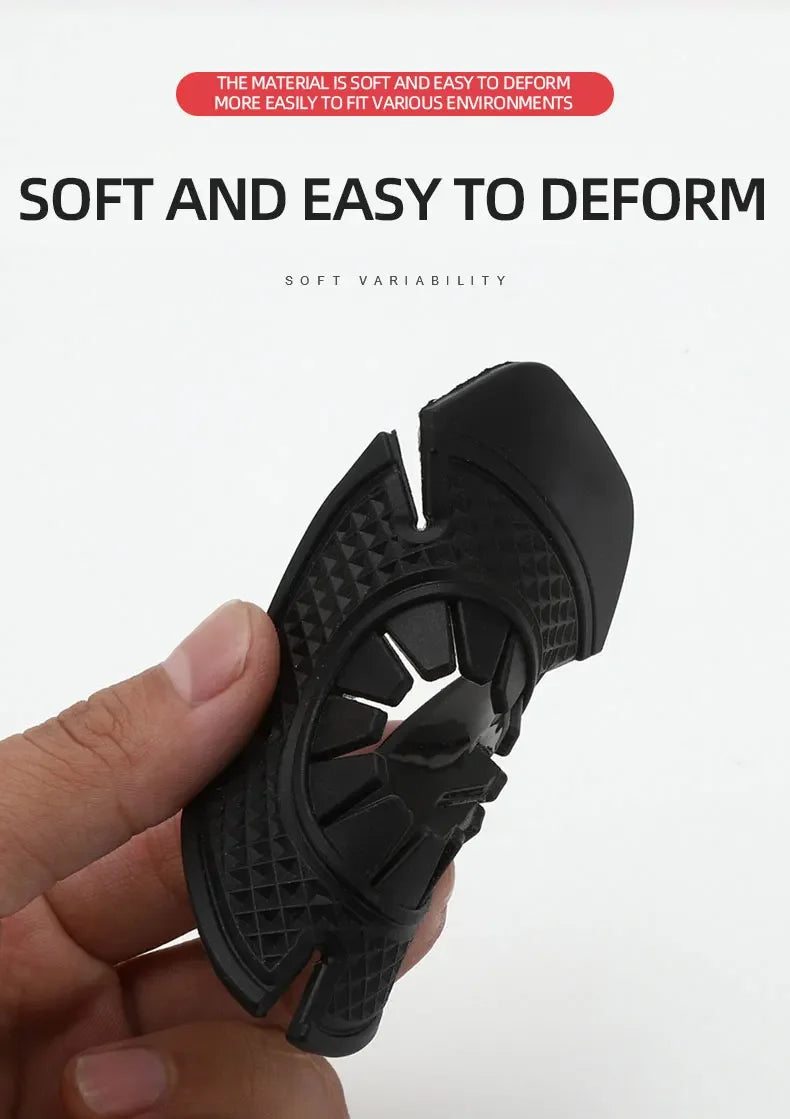 A hand is holding a black silicone windshield wiper arm hole cover, demonstrating its soft and deformable material.