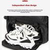 A black travel backpack with a dedicated shoe compartment showing a pair of white sneakers inside.