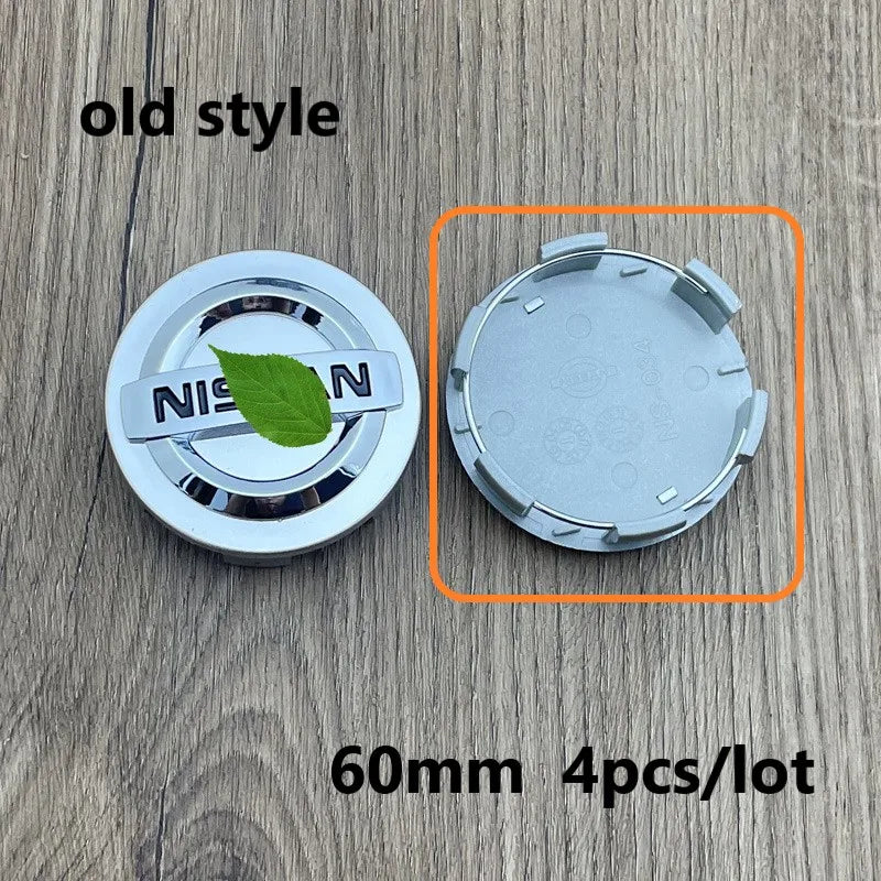 A set of four 60mm wheel center hub caps for Nissan models, shown with a close-up view of one cap.