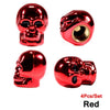 A set of four shiny red skull design tire valve stem caps.