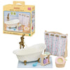 A Sylvanian Families bathroom set featuring a white bathtub, shower curtain, and accessories.