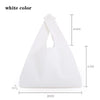 A white foldable canvas tote bag shown from the front, displaying its size and shape.