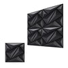 A close-up view of a black, geometric textured wall panel design.