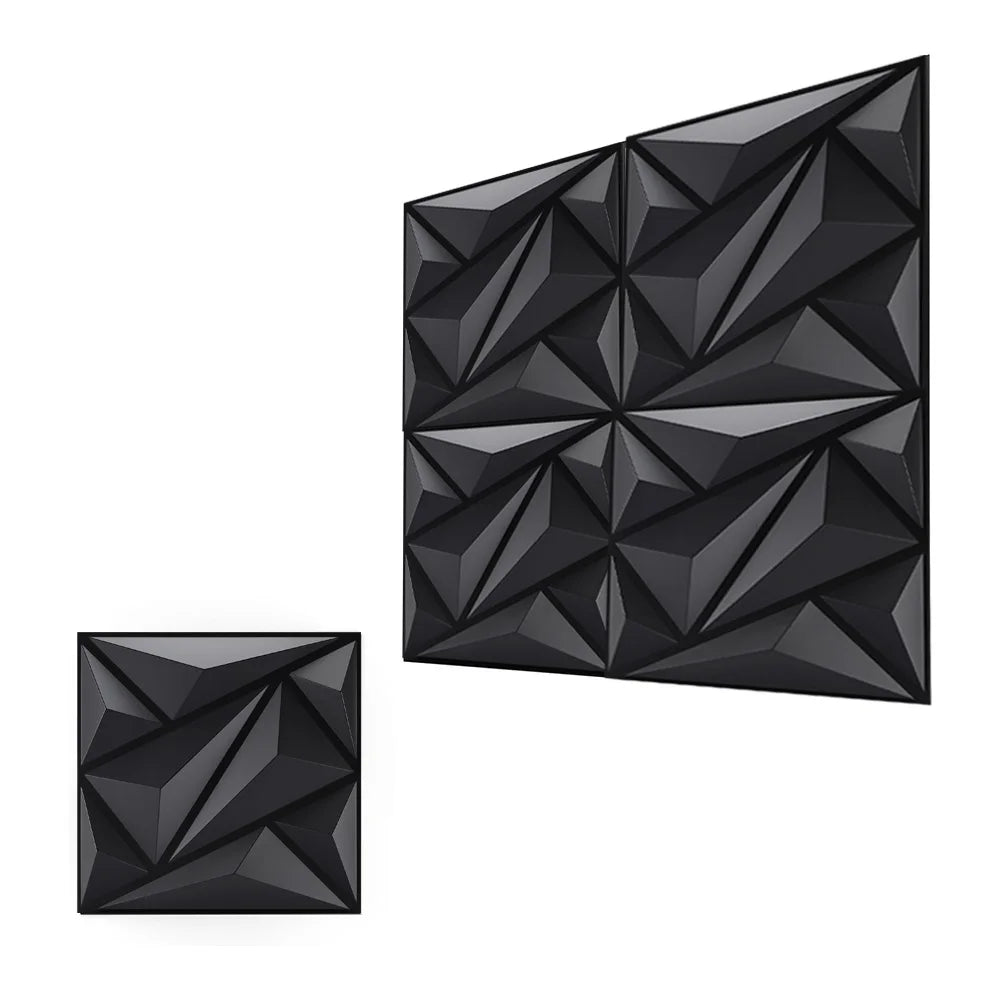 A close-up view of a black, geometric textured wall panel design.