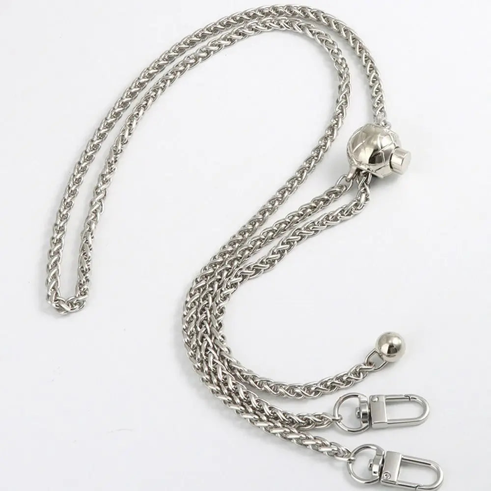 Silver twisted metal chain strap with a spherical clasp and jump rings for bags
