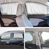 Interior view of a car showing a folded side window sun shade on the door and an exterior shot of the vehicle.