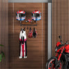 A motorcycle helmet wall mount featuring a wooden shelf displaying helmets and motorcycle gear.
