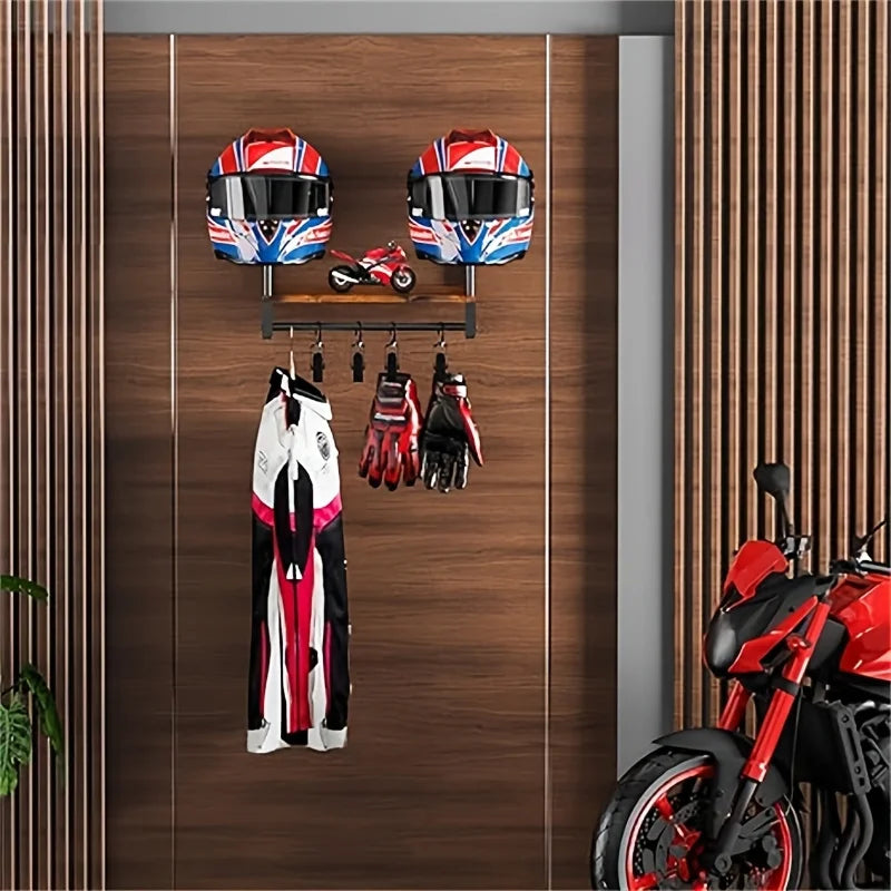 A motorcycle helmet wall mount featuring a wooden shelf displaying helmets and motorcycle gear.