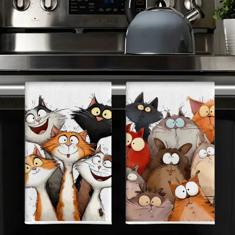 A set of two cartoon cat kitchen towels featuring various feline characters in watercolor style.