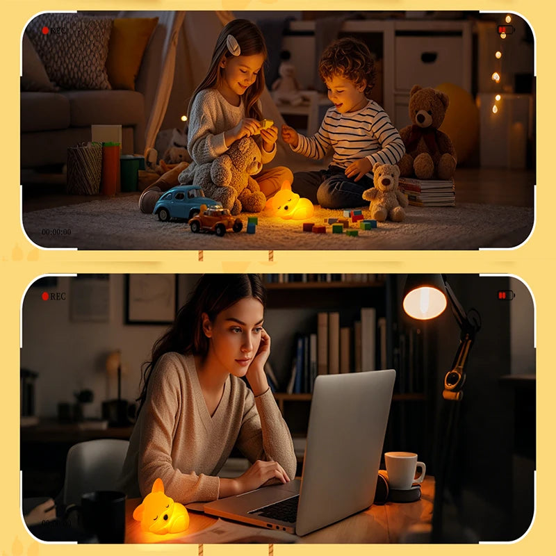 A person is using a laptop next to a squishy fox night light on a wooden table.
