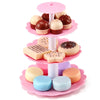 A pink kids pretend play tea set featuring various food items and a serving tray.