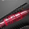 Close-up view of a red hot melt glue gun with glue sticks, highlighting its high-end PTC thermal design.