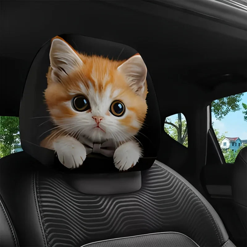 A cute orange tabby kitten is featured on a car headrest pillow cover.