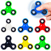 A collection of colorful smooth-spin fidget spinners in green, blue, white, red, and yellow.