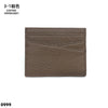 A brown genuine leather slim card holder wallet with stitched texture.