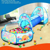 A blue and pink foldable kids play tent with a tunnel and ball pit on a floor.