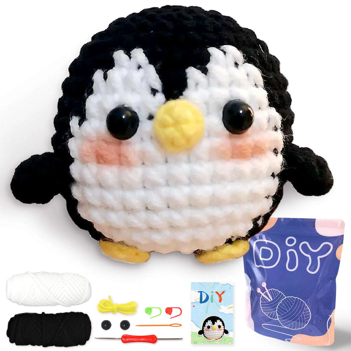 A beginner crochet kit featuring a cute black and white penguin amigurumi set with yarn and tools.