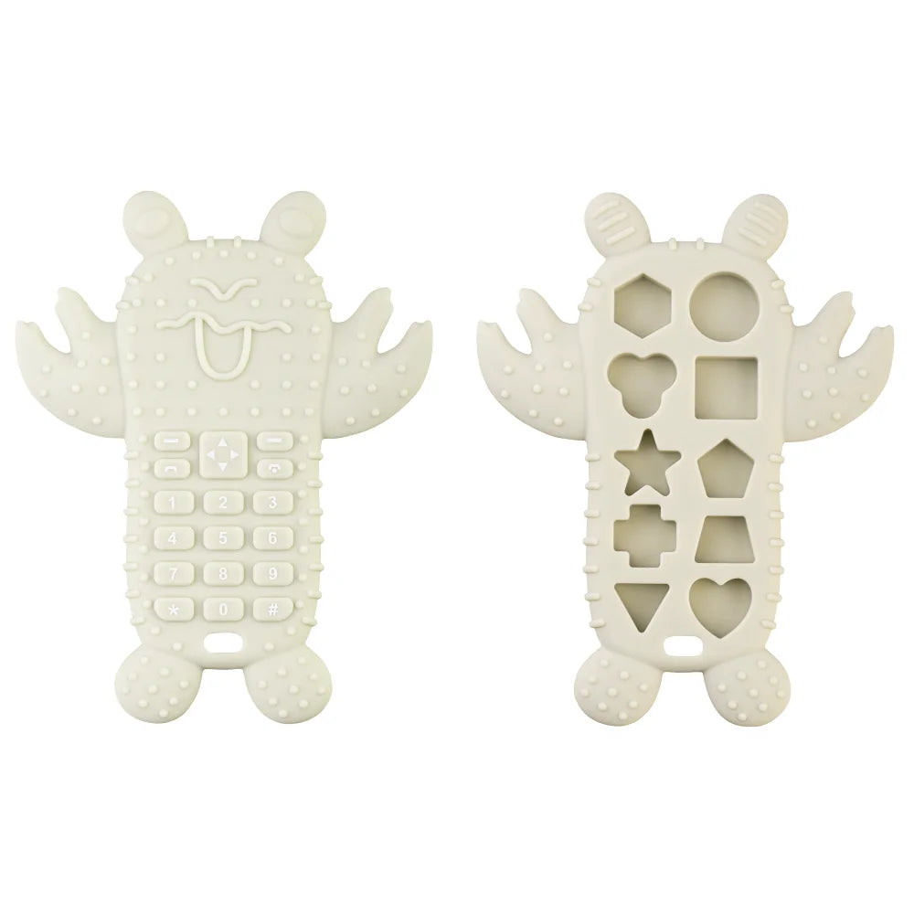A white silicone baby teether toy shaped like a remote control, featuring various holes and buttons.