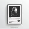 Black and white portrait of Drake in a hoodie framed in a black picture frame.