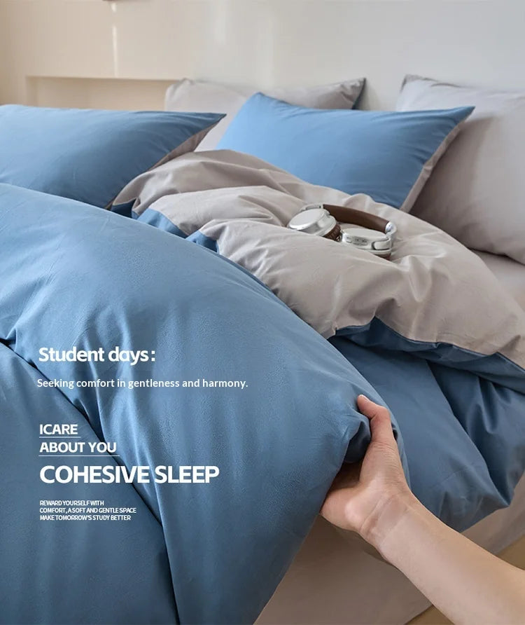 A close-up of a blue quilted duvet cover set and pillows on a bed, emphasizing cozy sleep.