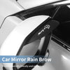 A close-up of an SRT car mirror rain brow accessory installed on a white car side mirror.