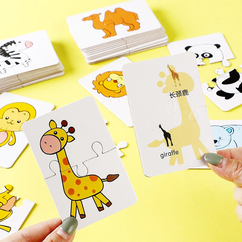 A hand holds a stack of colorful toddler animal and fruit puzzle cards featuring safari animals like a giraffe and panda.
