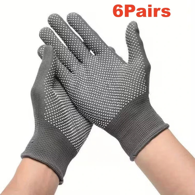 Six pairs of gray knitted anti-slip work gloves with a dotted grip shown on a person's hand and forearm.