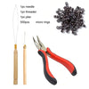 Complete hair extension installation kit including a needle, threader, pliers, and silicone-lined micro rings.