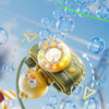 A yellow camera-shaped automatic bubble machine is shown floating with bubbles and light effects against a blue sky.