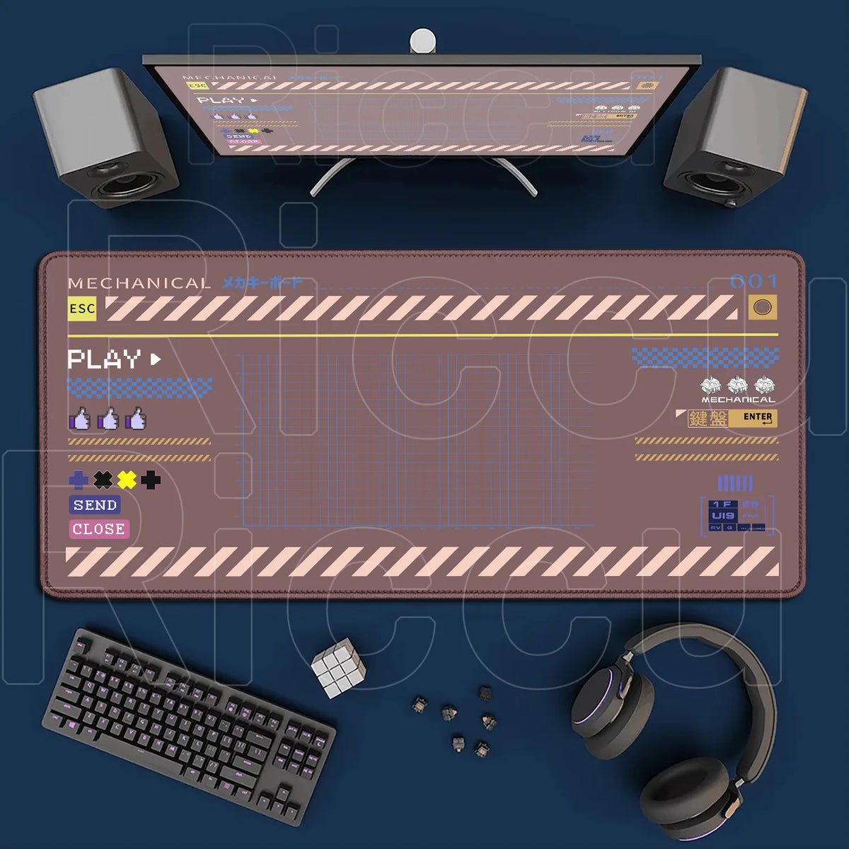 A Japanese art large mouse pad with a non-slip rubber base is displayed alongside a keyboard and headphones.