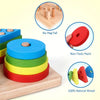 A stack of colorful wooden discs in various colors, demonstrating sorting and stacking skills for toddlers.