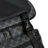 Close-up of a black PU leather backpack featuring a subtle gray damier pattern and black zippers.