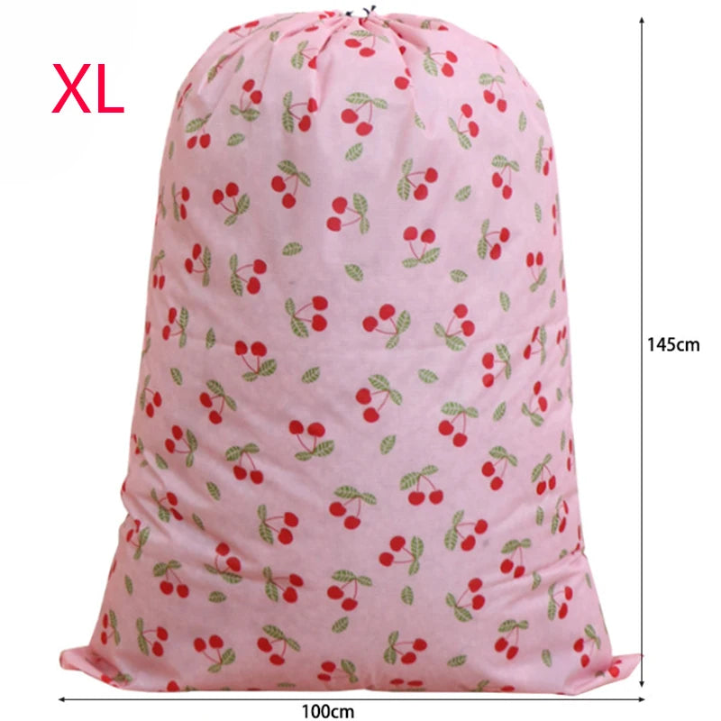 Pink XL drawstring laundry bag with a small red and green berry pattern