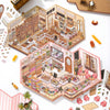 An open box of a 3D house scene sticker set featuring detailed miniature houses and architectural elements for scrapbooking