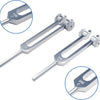 A set of three metal tuning forks with different frequencies marked on them for sound healing.