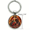 Silver key chain featuring a pendant of the Saint Michael Archangel with wings and a sword.