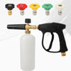A high-pressure foam cannon with a black handle and white tank is shown alongside five colored nozzles.