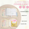 A large bible cover case with a zipper pocket, bookmark ribbon, maker slot, side pocket, and elastic pen is shown open on a l