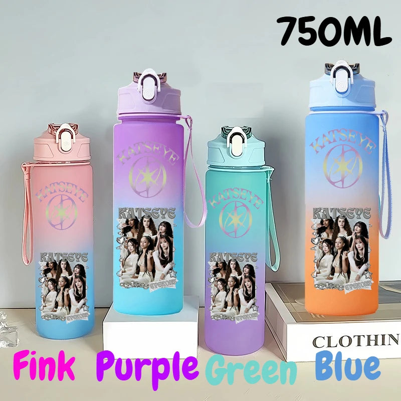 A set of three 750ml portable sports water bottles in pink, purple, and blue colors displayed on a white surface.