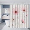 A floral shower curtain featuring pink peonies and greenery in a light gray background.