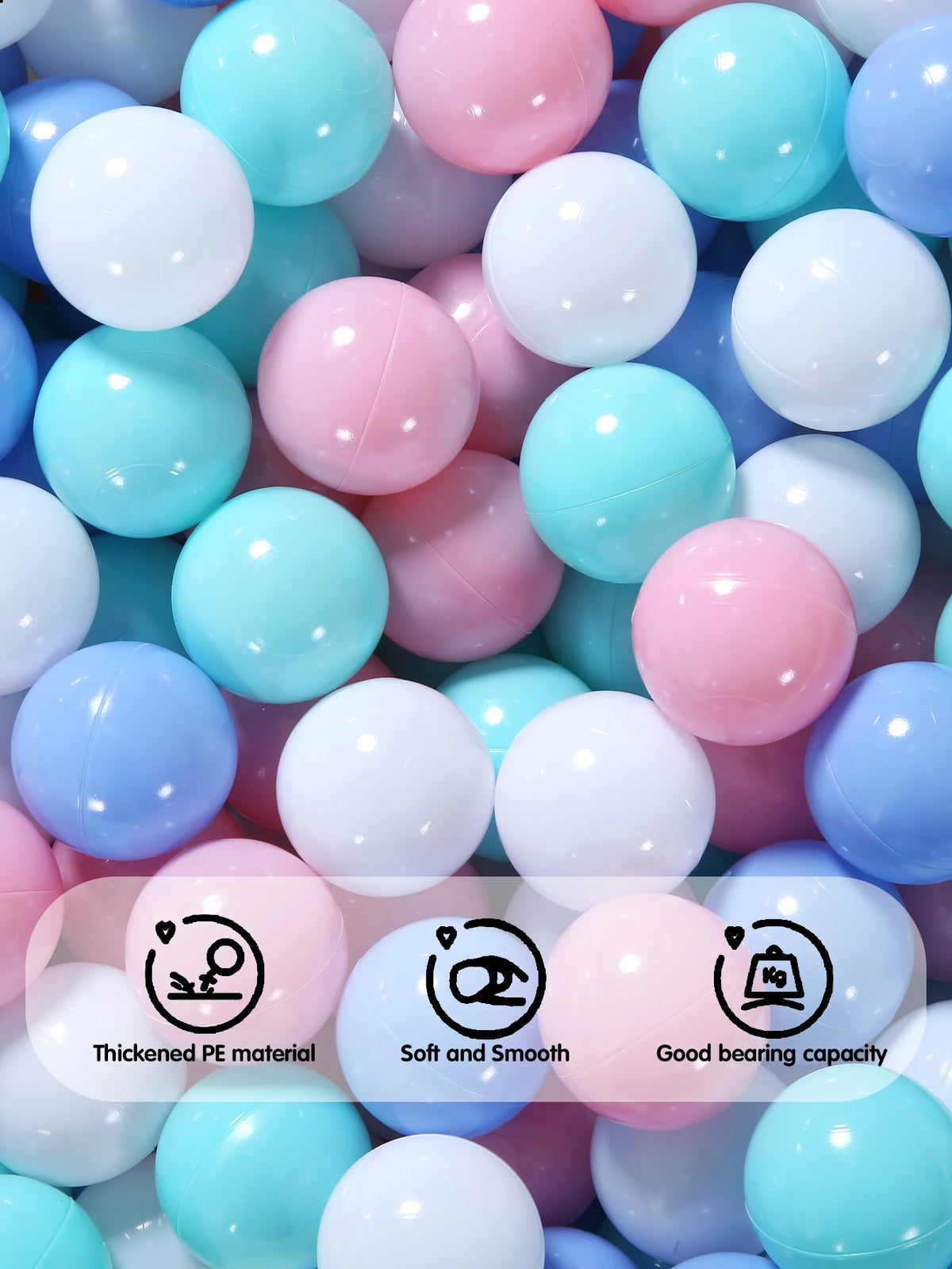 A close-up view of a variety of colorful, smooth ball pit balls in shades of pink, blue, and white.