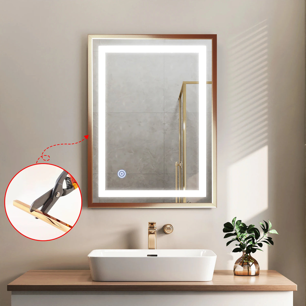 A bathroom vanity featuring a white vessel sink and a framed mirror with gold trim.