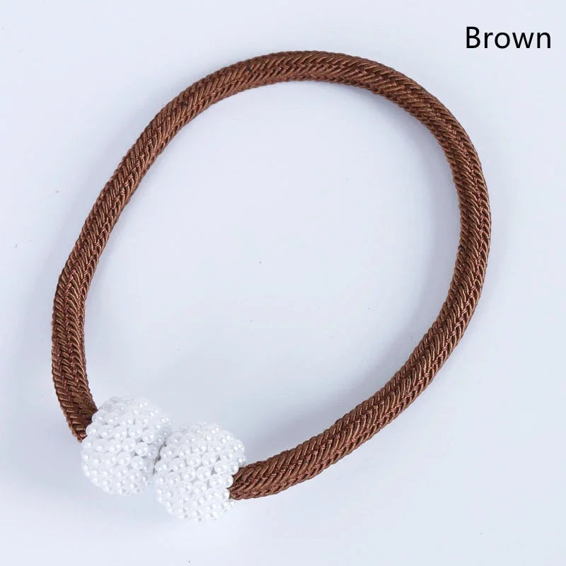 Brown braided magnetic curtain clips with white pearl accents