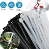 A close-up view of heavy-duty self-locking nylon cable ties in black and clear packaging, demonstrating their strength and pl