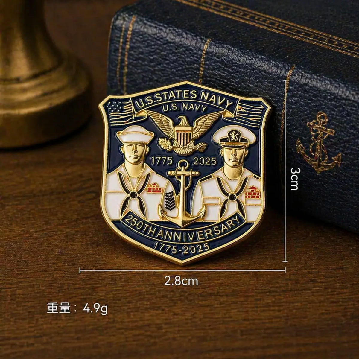 A gold-colored enamel lapel pin featuring the U.S. Navy 250th Anniversary design with an eagle and anchors.