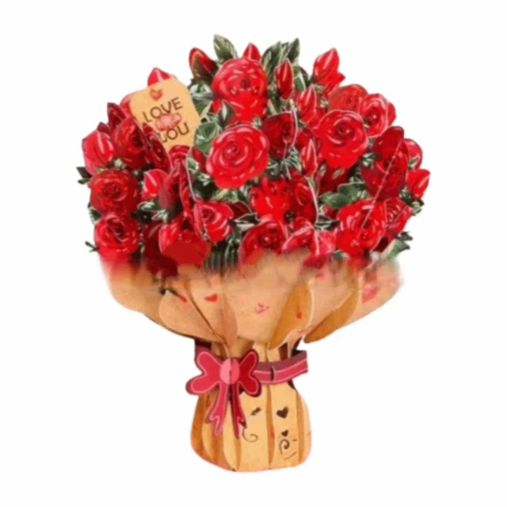 A bouquet of red roses and cherry blossoms tied with a pink ribbon in a kraft paper wrapping.