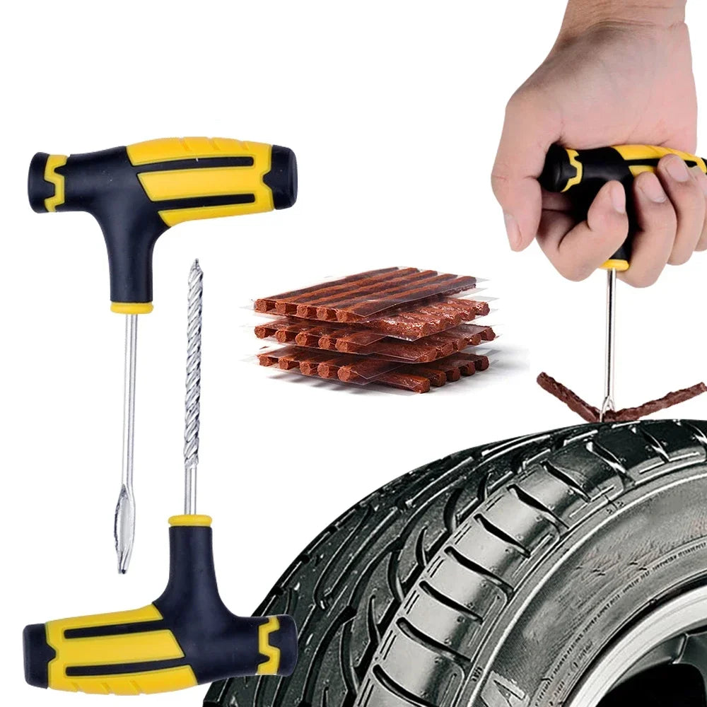 A hand holds a yellow and black tire repair tool with a needle, positioned above a tire.
