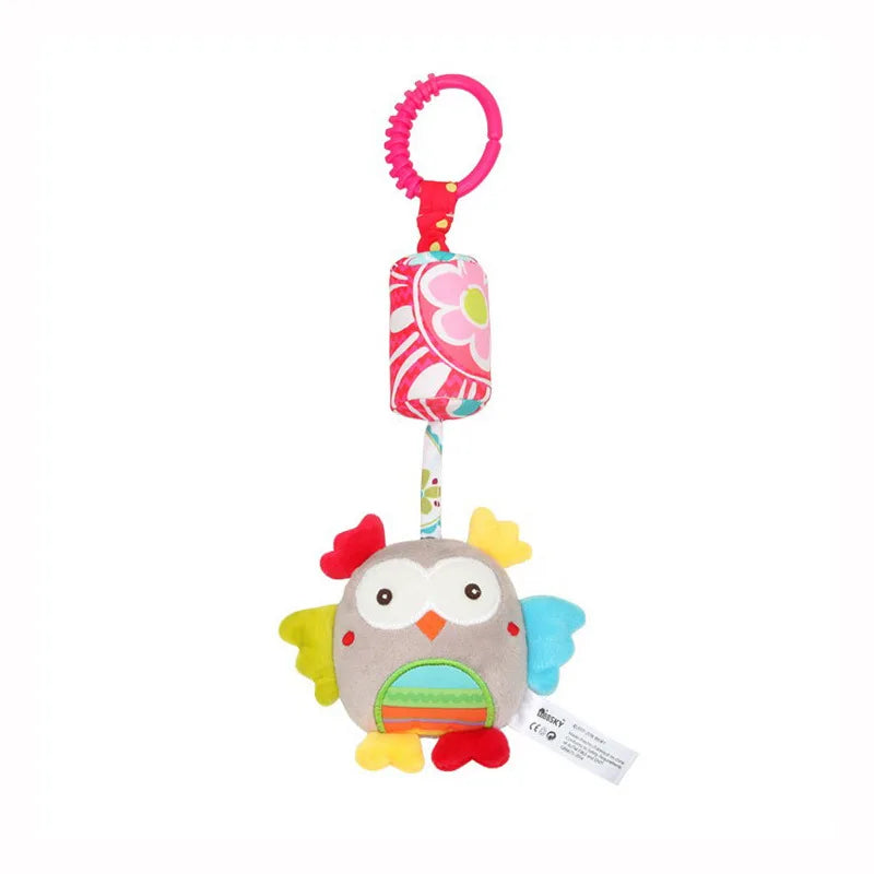 A soft plush baby rattle toy with a hanging bell shaped like a cartoon animal for newborns.