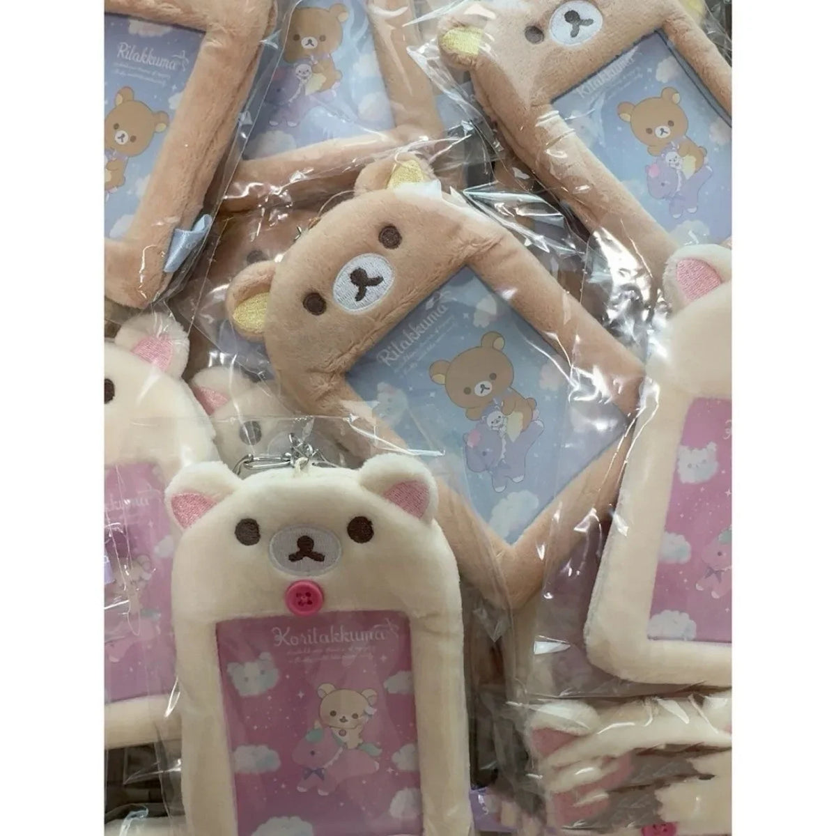 Rilakkuma plush ID card holder and keychain featuring a soft, light brown bear character.