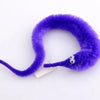 A purple fuzzy caterpillar trick with a small silver eye detail.